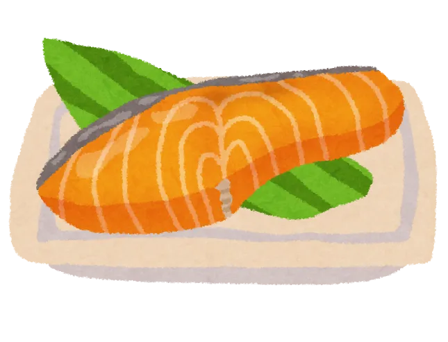 Gebratener Lachs auf einem Teller als Essen.